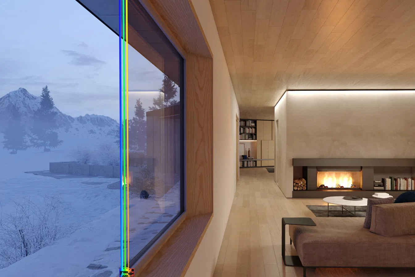 Slim thermally broken aluminum picture window framing a snowy mountain view from a warm timber-lined living room
