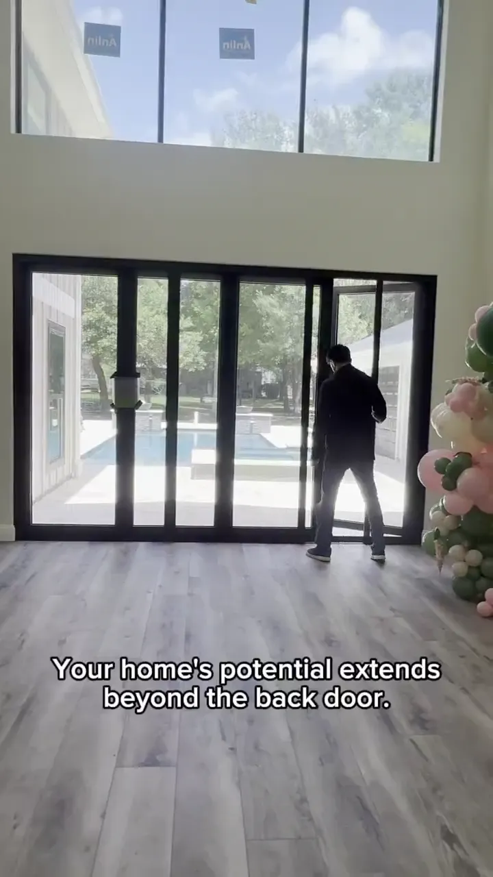 Premium aluminum bifold glass door folded fully open for an unobstructed indoor-outdoor connection