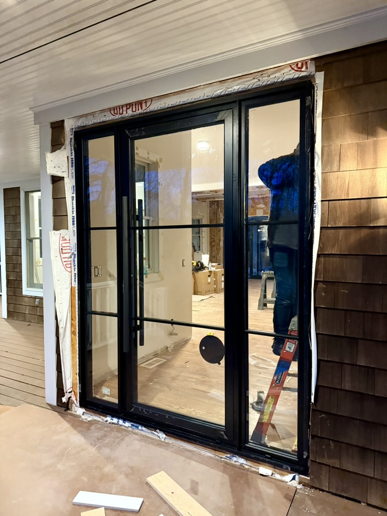 Entry Doors project — East Hampton Residence: Aluminum French Entry Door with Grid Pattern · East Hampton, NY