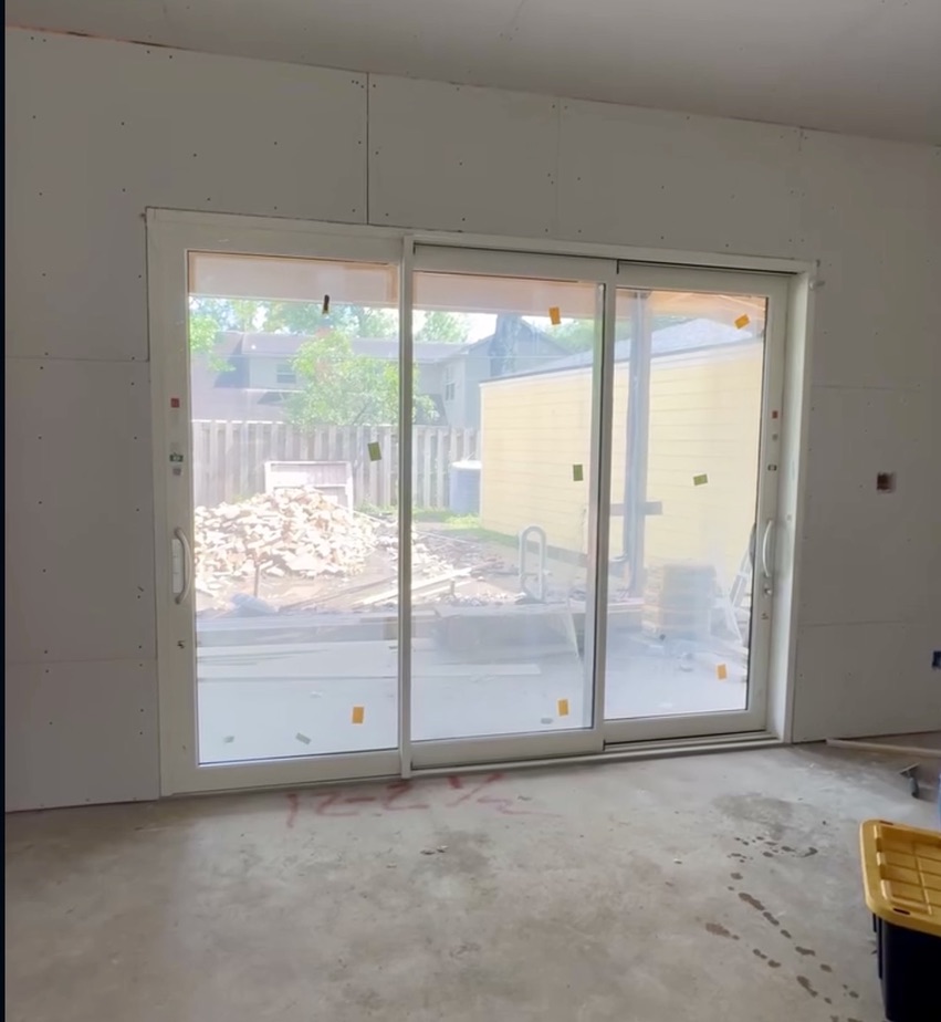Sliding Doors project — Houston Dual Color: 10' W x 8' H – 3 Panel Multi-Slide Glass Door, White Interior / Black Exterior · Houston, TX