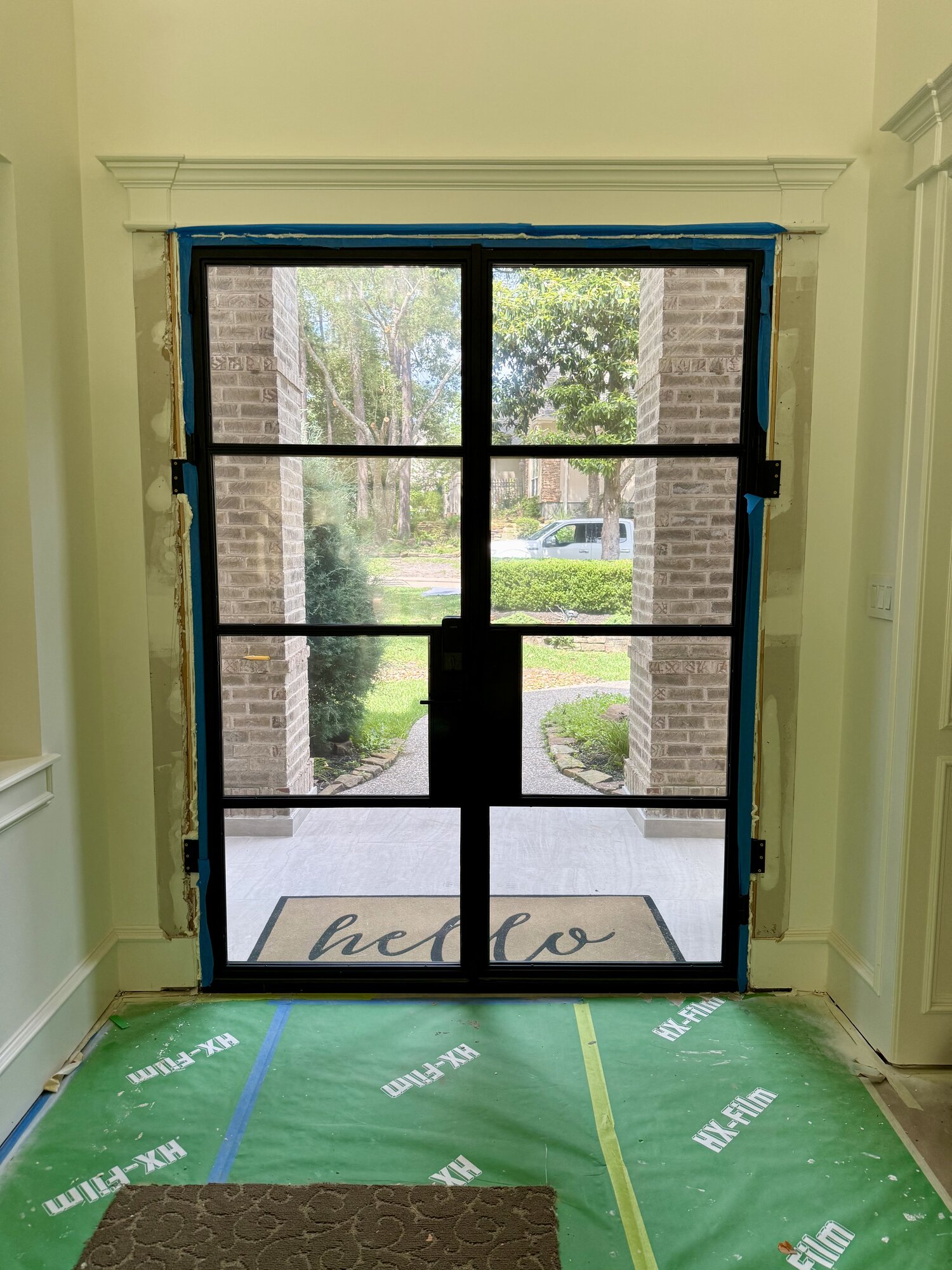 Humble TX entry door with one-way mirror glass — clear interior view