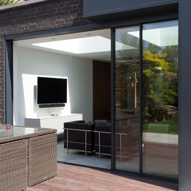 Pocket glass door closed — floor-to-ceiling glass panels
