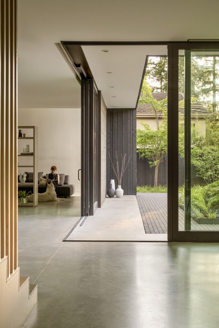 Minimalist interior with seamless indoor-outdoor sliding door transition